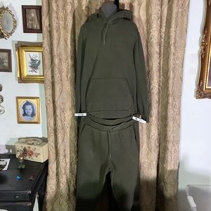 Green fleece Puma sweater and sweat pants.